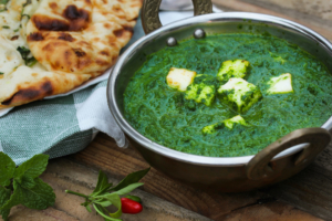 Palak Paneer Indian vegetarian curry with spinach sauce